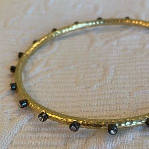 Gold and black studded bangle bracelet